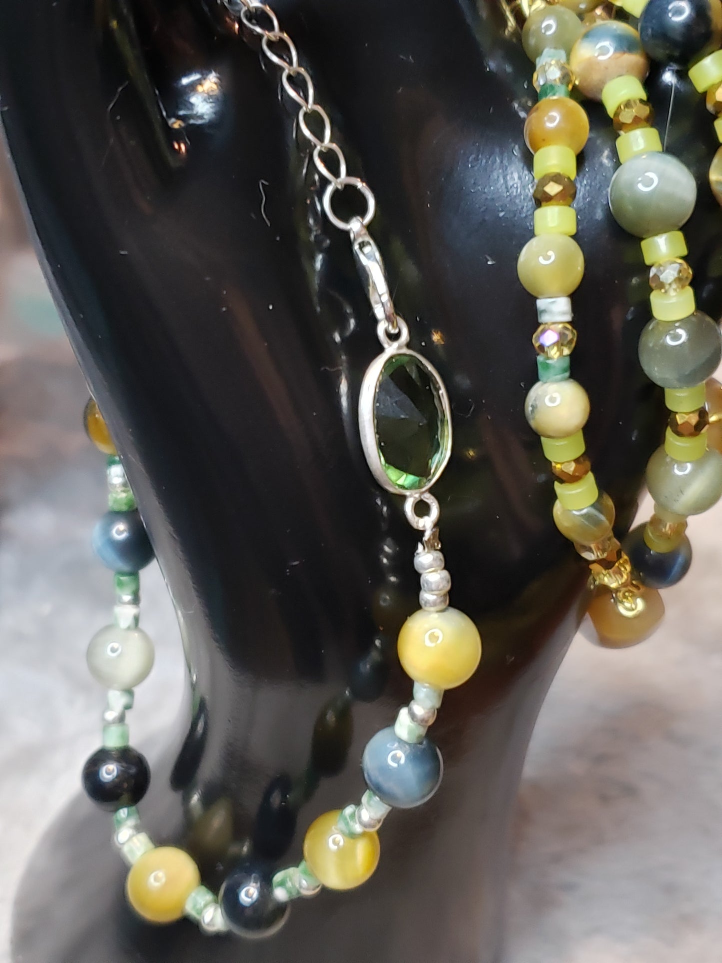 Exquisite design 4 bracelets with light Jade, Topaz and Tiger eye SOLD