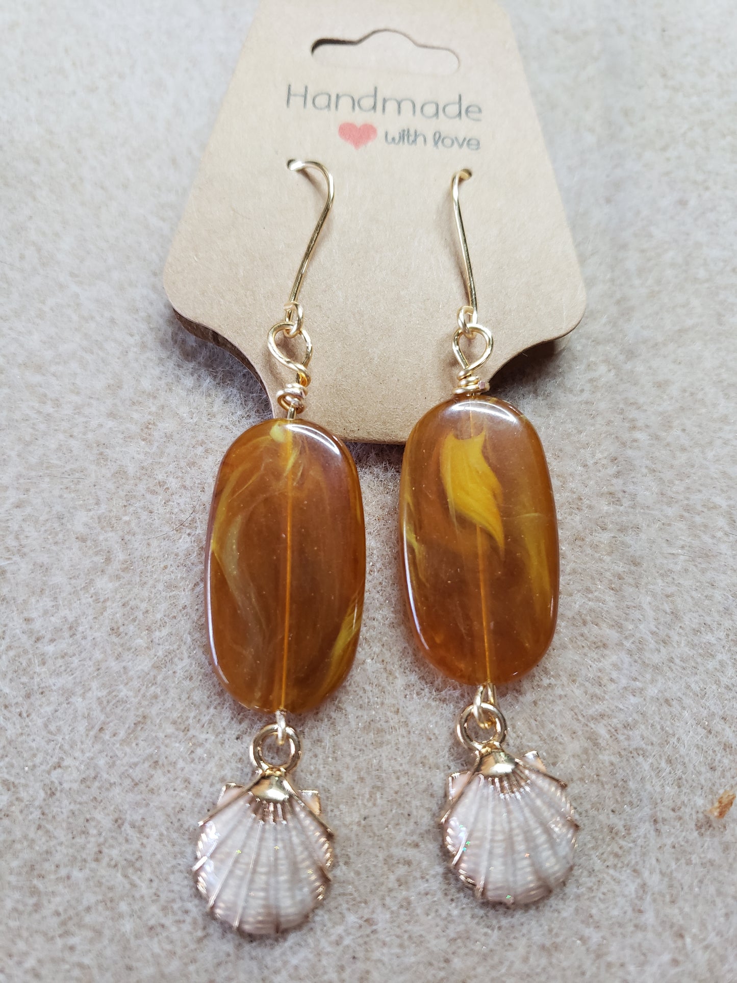 By the sea series - Synthetic Amber Elongated stone earring with Sand trim with gold Clam Shell Charm