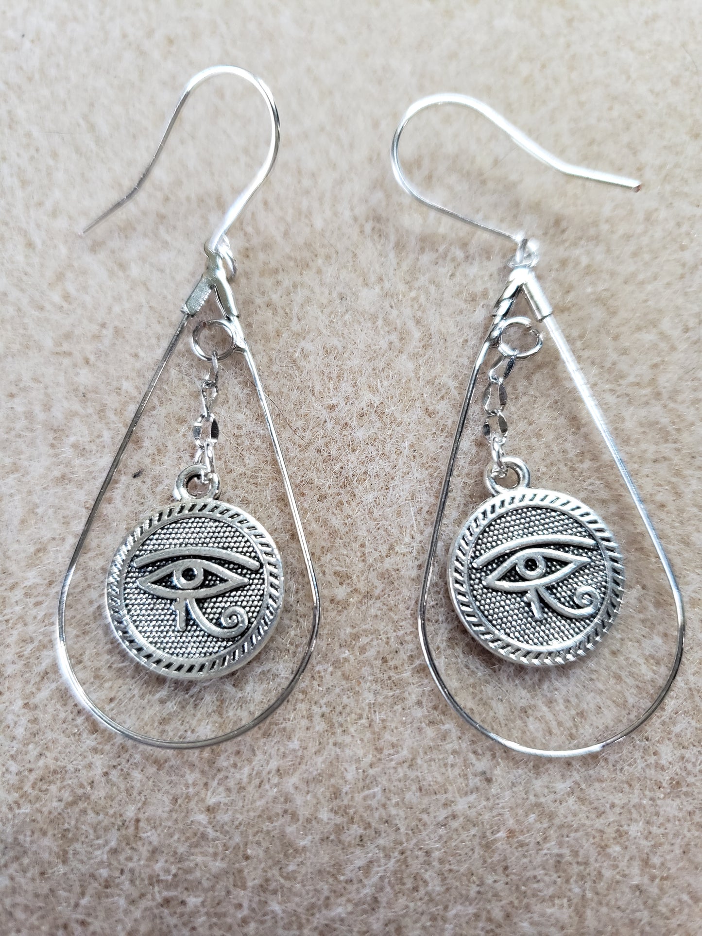 The Sea Series-Silver Pear shaped Earring with Eye of Horus Charm