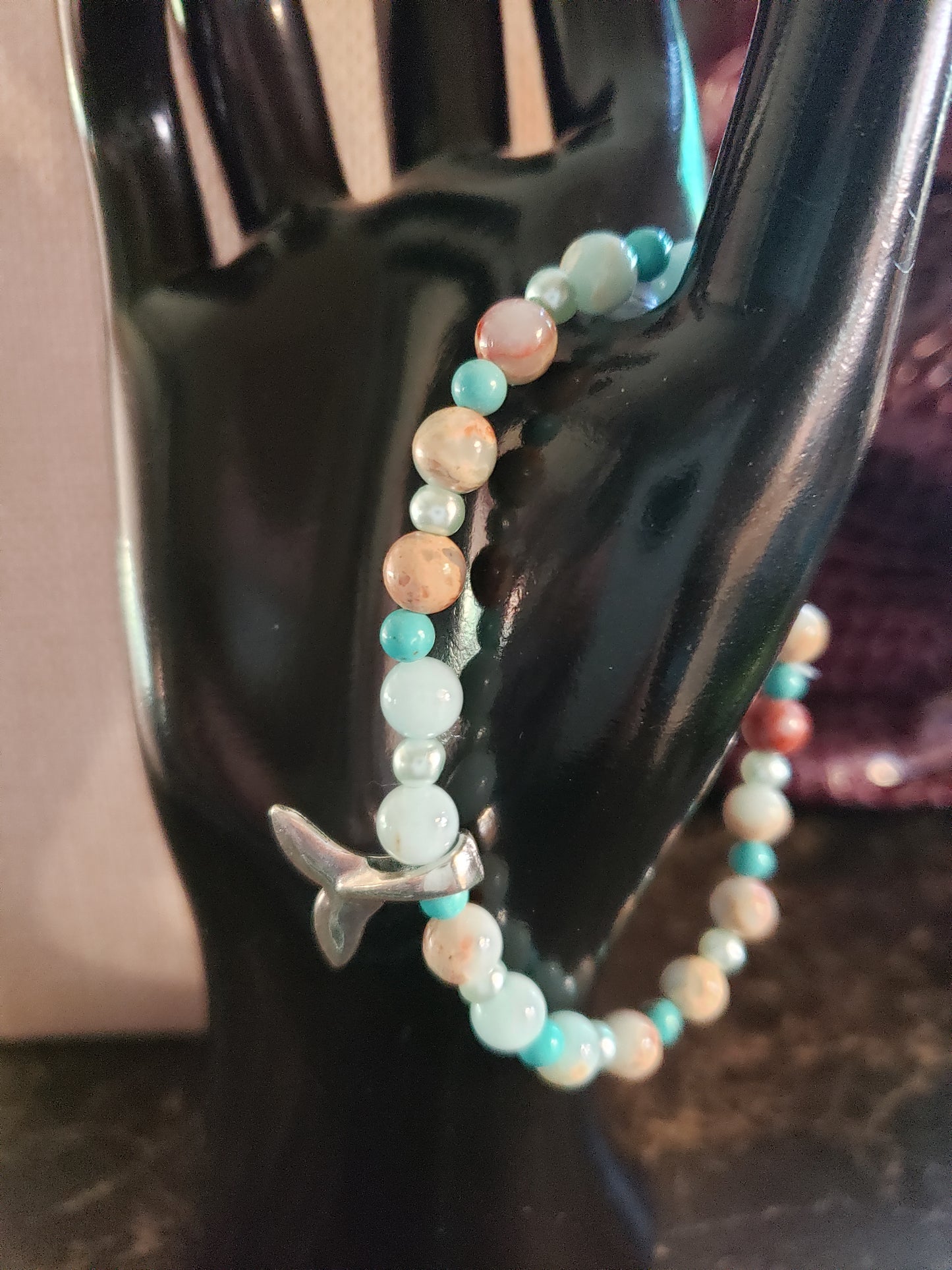 By the sea turquoise  stretchy bracelet with silver dolphin tail charm