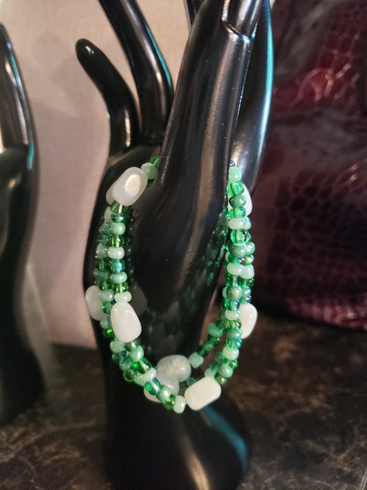 Tropical stretchy beaded white jade  and iridescent beads