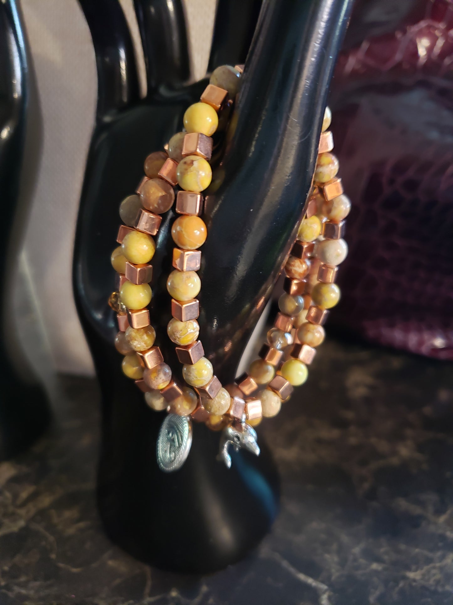Earth tone stretchy bracelet with copper accents and yellow agate beads