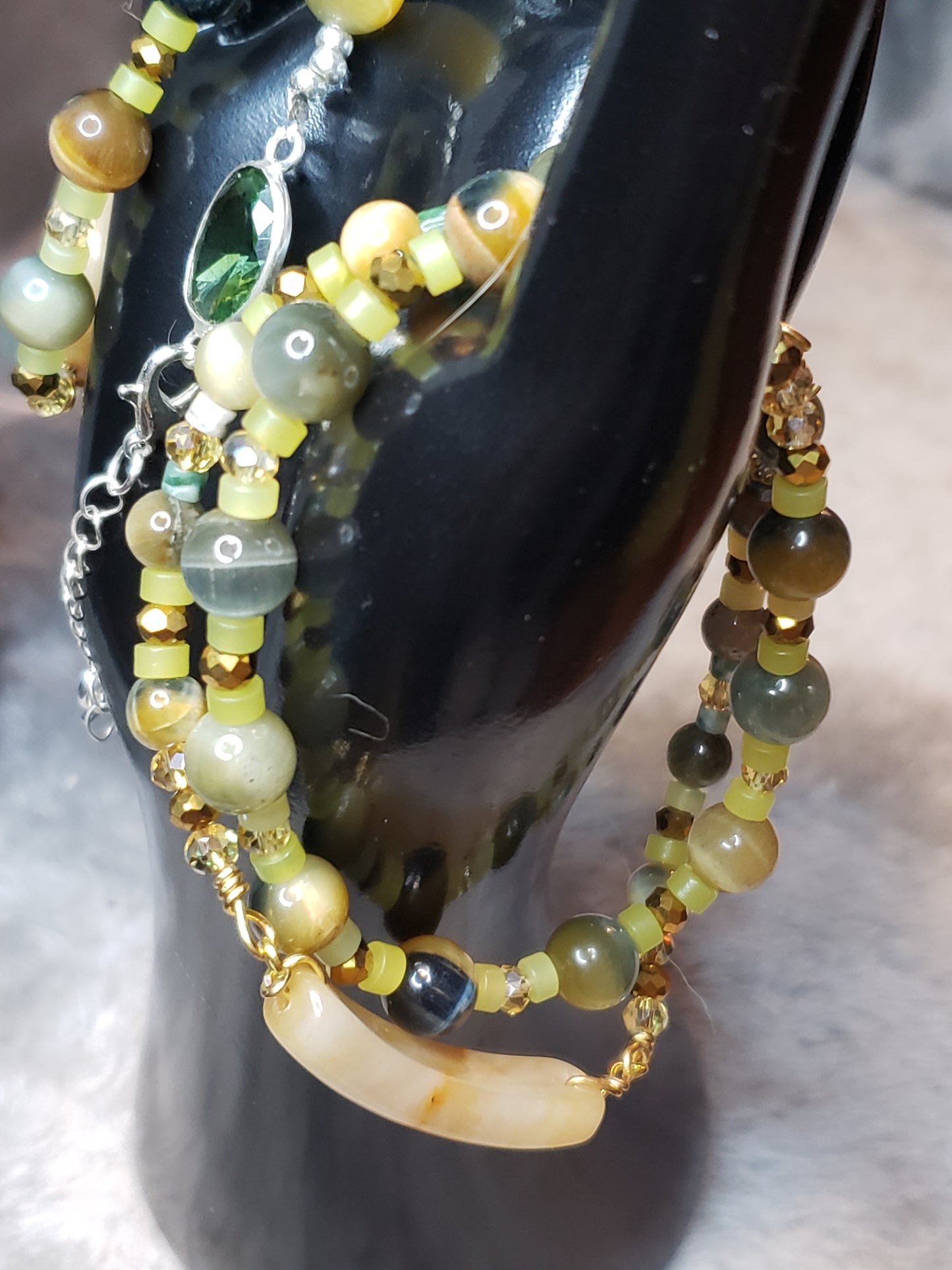 Exquisite design 4 bracelets with light Jade, Topaz and Tiger eye  SOLD