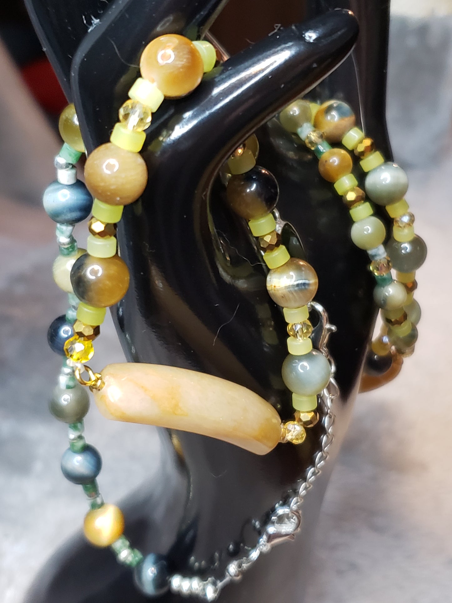 Exquisite design 4 bracelets with light Jade, Topaz and Tiger eye  SOLD